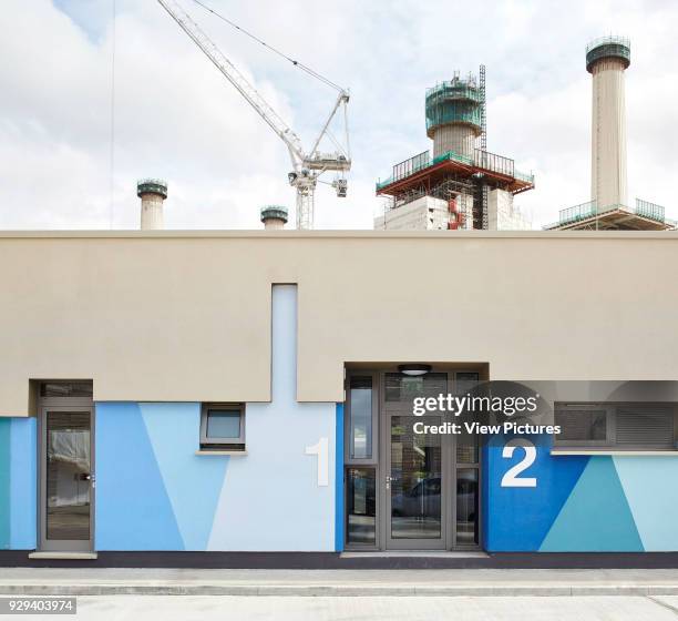 Individual entrance to kennel block. Battersea Dogs & Cats Home, London, United Kingdom. Architect: Jonathan Clark Architects, 2015.