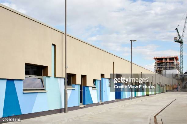 Perspective of colour coded facade and circulation space. Battersea Dogs & Cats Home, London, United Kingdom. Architect: Jonathan Clark Architects,...