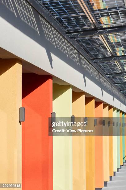 Color coded facade perspective with photovoltaic canopy. Battersea Dogs & Cats Home, London, United Kingdom. Architect: Jonathan Clark Architects,...