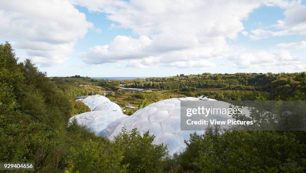 Biome domes inserted in landscape. Eden Project, Bodelva, United Kingdom. Architect: Grimshaw, 2016.