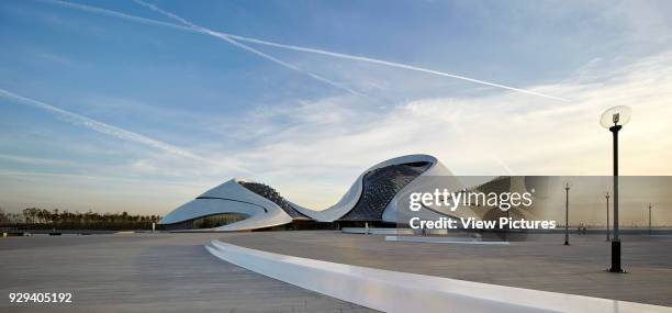 Panorama of open piazza in front of building. Harbin Opera House, Harbin, China. Architect: MAD Architects, 2015.