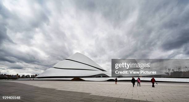 Wide barren piazza with building beyond. Harbin Opera House, Harbin, China. Architect: MAD Architects, 2015.