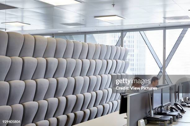 Padded movable sound proof walls and ioffice workers at desks. Office Space at The Gherkin, London, United Kingdom. Architect: IOR GROUP Interiors,...