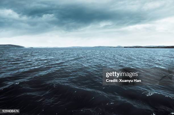 sea with clouds - lake horizon stock pictures, royalty-free photos & images