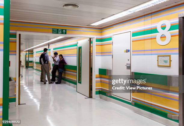 8th floor with students. St Mary's Hospital, London, United Kingdom. Architect: Bridget Riley, 2014.