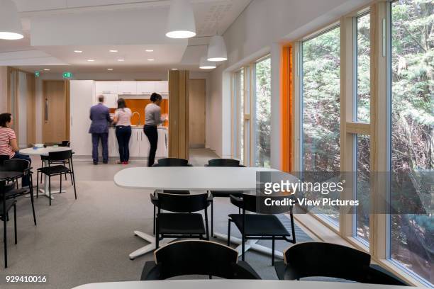 First floor break out area towards kitchen. The Office in the Park, Greenford, United Kingdom. Architect: Dannatt, Johnson Architects, 2015.