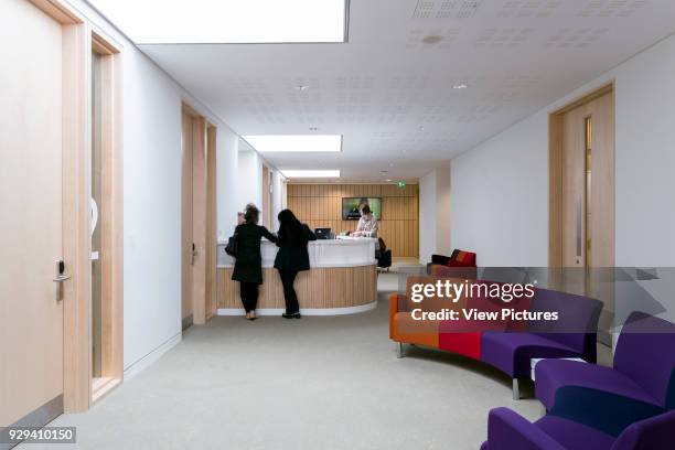 Reception area from entrance doors. The Office in the Park, Greenford, United Kingdom. Architect: Dannatt, Johnson Architects, 2015.