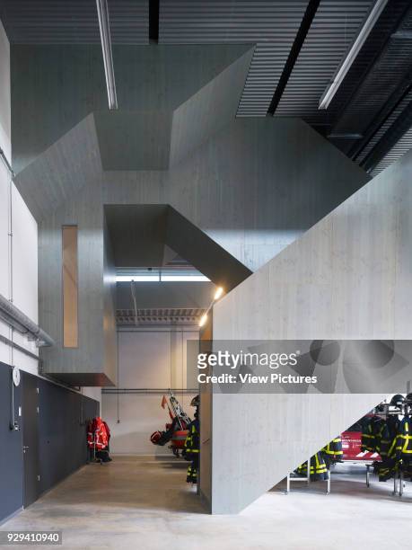 Cloakroom in garage area. Fire Station Dordrecht, Dordrecht, Netherlands. Architect: Rene van Zuuk, 2011.