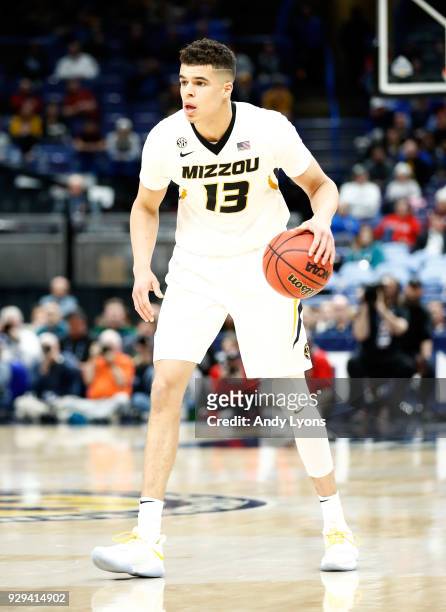 Michael Porter Jr of the Missouri Tigers dribbles the ball against the Georgia Bulldogs during the second round of the 2018 SEC Basketball Tournament...