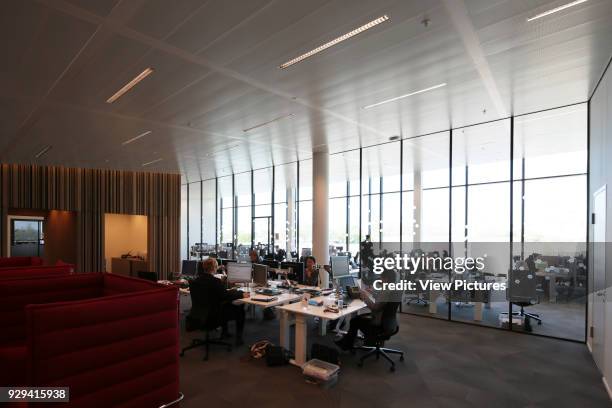 Rabobank Westelijke Mijnstreek, Sittard, Sittard, Netherlands. Architect: Mecanoo, 2014. Open plan call centre with full-height fenestration.
