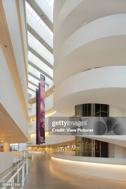 Museum Street atrium seen from secondary entrance, with spiral staircase on right and ticket desk in background. ARoS Aarhus Kunstmuseum, Aarhus,...