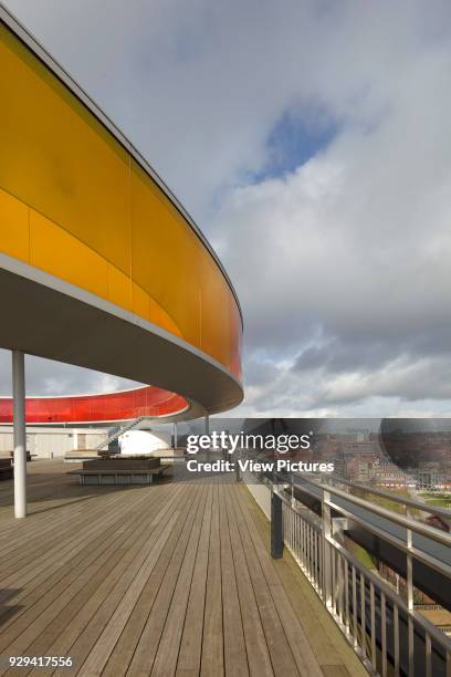 Your Rainbow Panorama' circular aerial walkway with cityscape beyond and timber-floored rooftop terrace. ARoS Aarhus Kunstmuseum, Aarhus, Denmark....