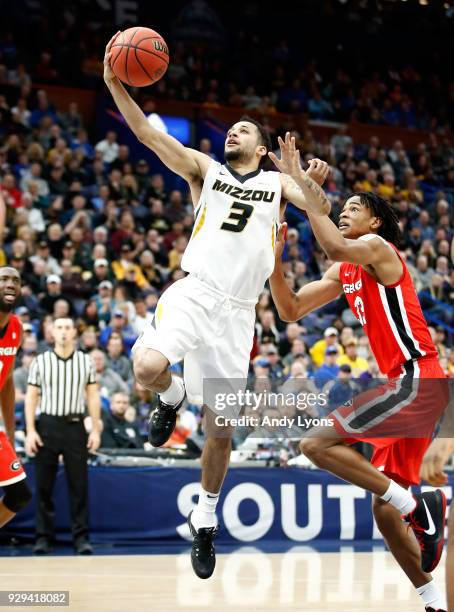 Kassius Robertson of the Missouri Tigers shoots the ball against the Georgia Bulldogs during the second round of the 2018 SEC Basketball Tournament...