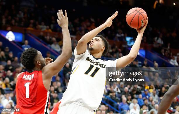 Jontay Porter of the Missouri Tigers shoots the ball against the Georgia Bulldogs during the second round of the 2018 SEC Basketball Tournament at...