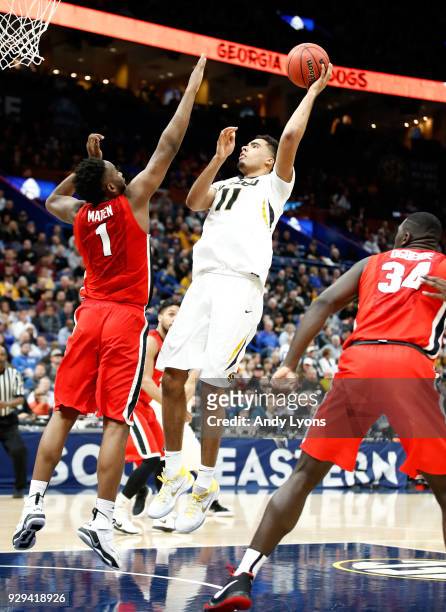 Jontay Porter of the Missouri Tigers shoots the ball against the Georgia Bulldogs during the second round of the 2018 SEC Basketball Tournament at...