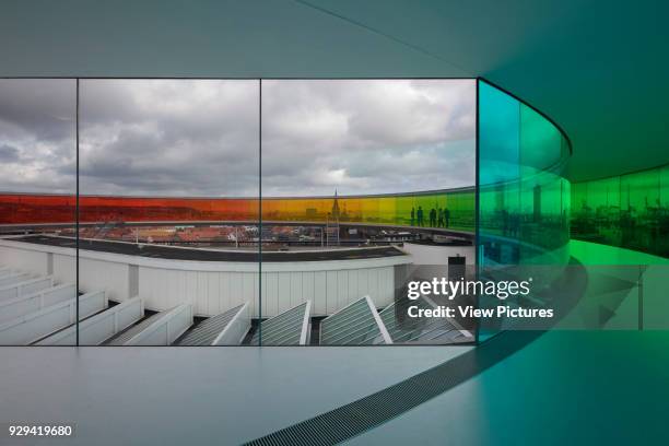Your Rainbow Panorama' circular aerial walkway with view to exterior with cityscape beyond. ARoS Aarhus Kunstmuseum, Aarhus, Denmark. Architect:...