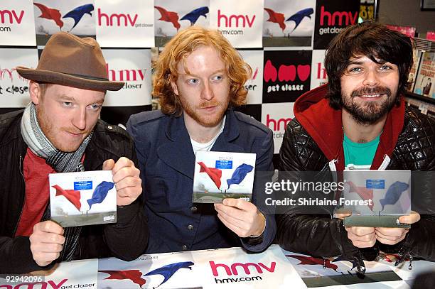 Ben Johnston, James Johnston and Simon Neil of Biffy Clyro promotes 'Only Revolutions' at HMV on November 9, 2009 in Birmingham, England.