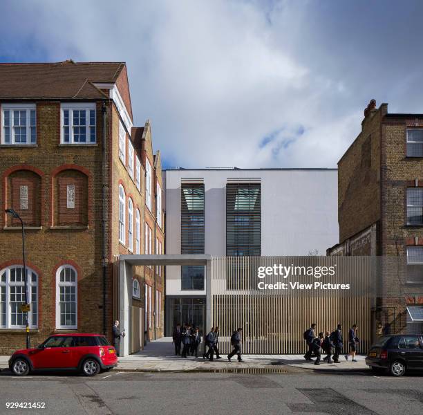 Entrance gate on Chalton Street with students leaving. Regent High School, London, United Kingdom. Architect: Walters and Cohen Ltd, 2015.