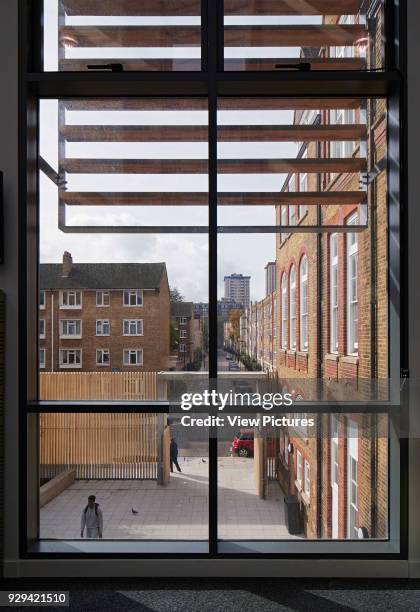 Elevated view towards entrance gate on Chalton Street. Regent High School, London, United Kingdom. Architect: Walters and Cohen Ltd, 2015.