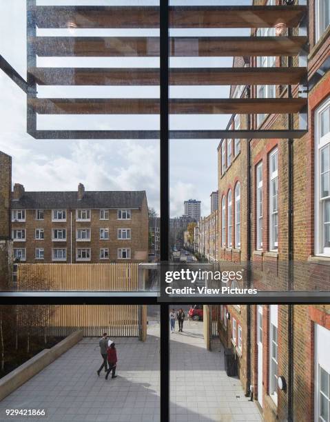 Elevated view from library to entrance gate on Chalton Street. Regent High School, London, United Kingdom. Architect: Walters and Cohen Ltd, 2015.