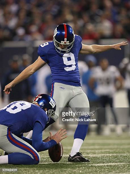 Lawrence Tynes of the New York Giants kicks the ball against the San Diego Chargers at Giants Stadium on November 8, 2009 in East Rutherford, New...