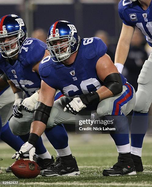 Shaun O'Hara of the New York Giants prepares to snap against the San Diego Chargers at Giants Stadium on November 8, 2009 in East Rutherford, New...