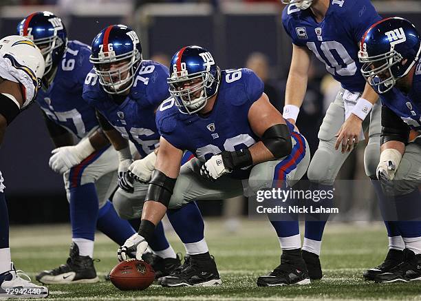 Shaun O'Hara of the New York Giants prepares to snap against the San Diego Chargers at Giants Stadium on November 8, 2009 in East Rutherford, New...