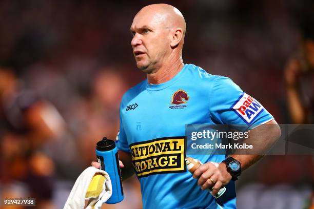 Broncos trainer Allan Langer runs water during the round one NRL match between the St George Illawarra Dragons and the Brisbane Broncos at UOW...