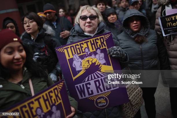 Women, activists, and SEIU members hold a rally to celebrate International Womens Day on March 8, 2018 in Chicago, Illinois. International Womens Day...