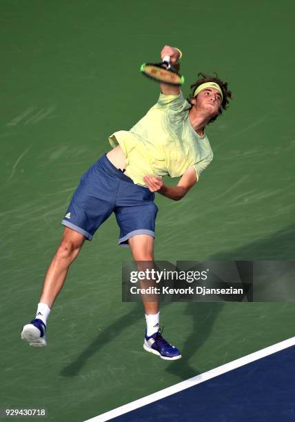 Stefanos Tsitsipas, of Greece, serves against Radu Albot, of Moldova, during Day 4 of the BNP Paribas Open on March 8, 2018 in Indian Wells,...