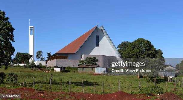 Overall view from field below. Sacred Heart Cathedral Of The Catholic Diocese Of Kericho, Kericho, Kenya. Architect: John McAslan & Partners, 2016.