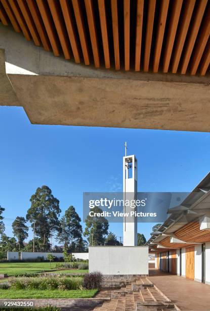 View from covered terrace. Sacred Heart Cathedral Of The Catholic Diocese Of Kericho, Kericho, Kenya. Architect: John McAslan & Partners, 2016.