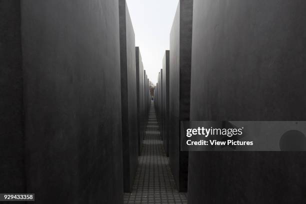 Memorial to the Murdered Jews of Europe, Berlin, Germany. Architect: Peter Eisenman, 2005. Path through the Jewish Memorial Stone work.