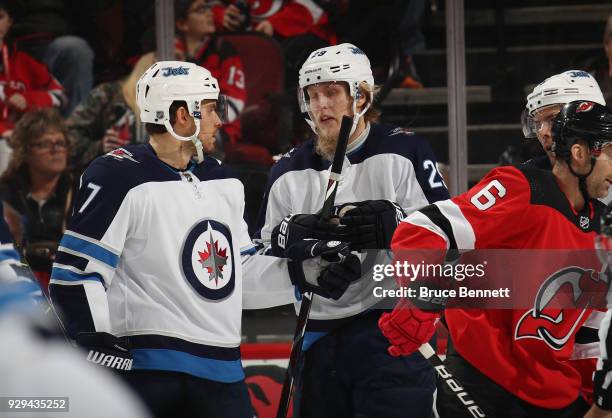 Patrik Laine of the Winnipeg Jets celebrates his first-period goal against Steve Mason of the Winnipeg Jets at the Prudential Center on March 8, 2018...
