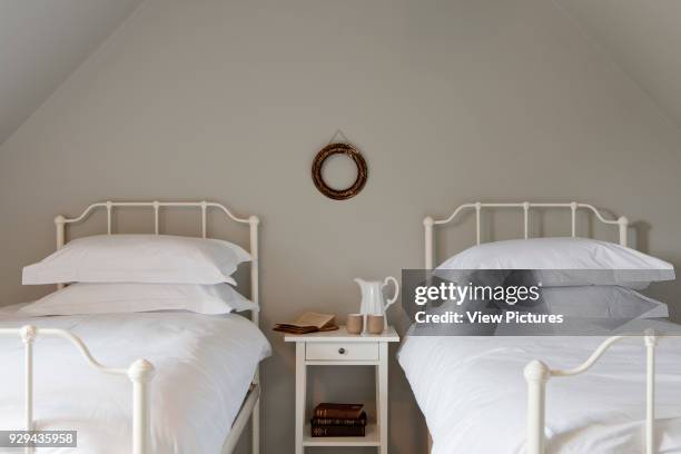 The Bridgettine Guesthouse, Iver Heath, United Kingdom. Architect: Monica Mauti , 2013. Detail of the bedroom.