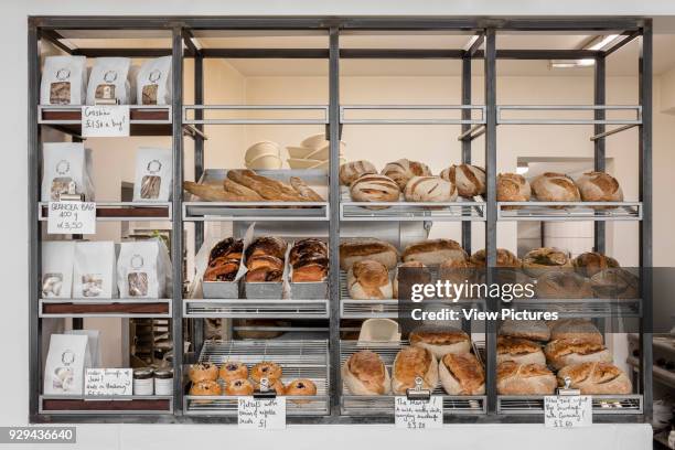 Bread shelves detail. Margot Bakery, London, United Kingdom. Architect: Lucy Tauber, 2016.