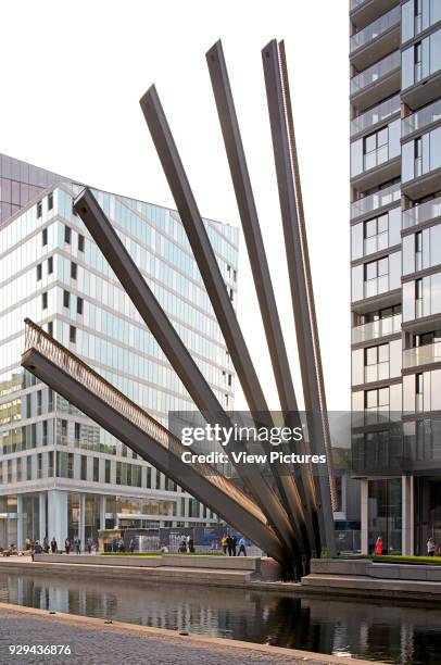 Merchant Square Footbridge, London, United Kingdom. Architect: Knight Architects Limited, 2014. Overall view with bridge in elevated position.