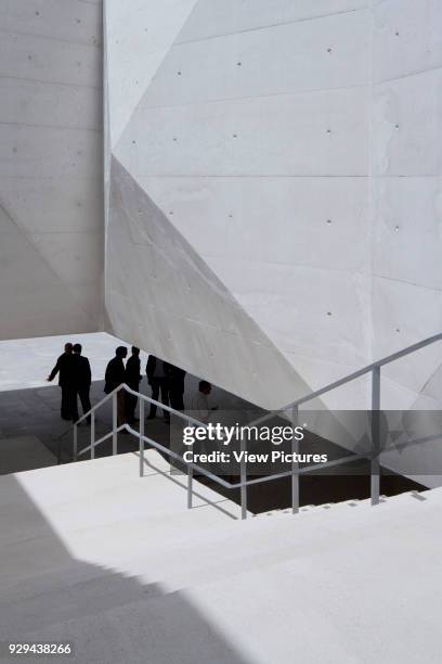 Stairway viewed from above. Palacio da Justicia de Gouveia, Gouveia, Portugal. Architect: Barbosa & Guimaraes, 2011.