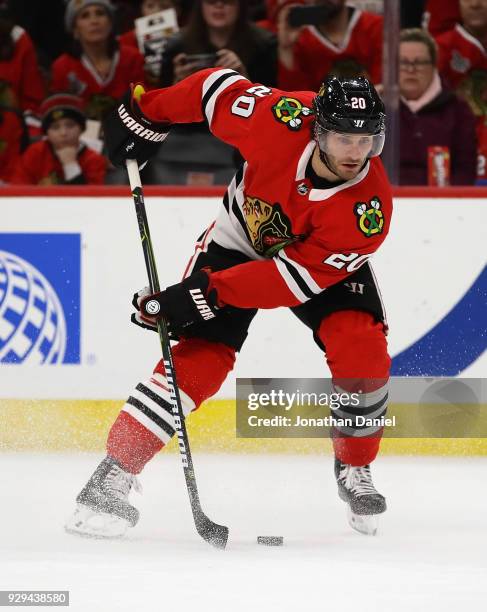 Brandon Saad of the Chicago Blackhawks looks to pass against the Washington Capitals at the United Center on February 17, 2018 in Chicago, Illinois....
