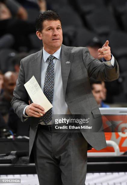 Head coach Steve Alford of the UCLA Bruins gestures during a quarterfinal game of the Pac-12 basketball tournament against the Stanford Cardinal at...
