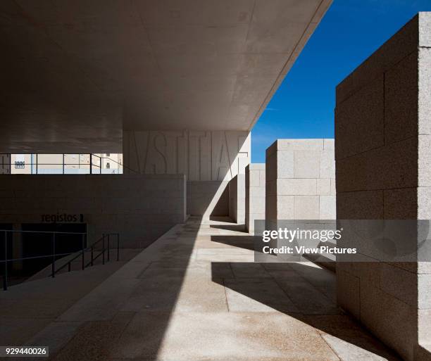 Detail of concrete and granite usage on ground floor Plaza. Palacio da Justicia de Gouveia, Gouveia, Portugal. Architect: Barbosa & Guimaraes, 2011.