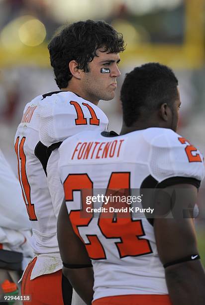 Quarterback Zac Robinson of the Oklahoma State Cowboys looks on during the game against the Iowa State Cyclones at Jack Trice Stadium on November 7,...