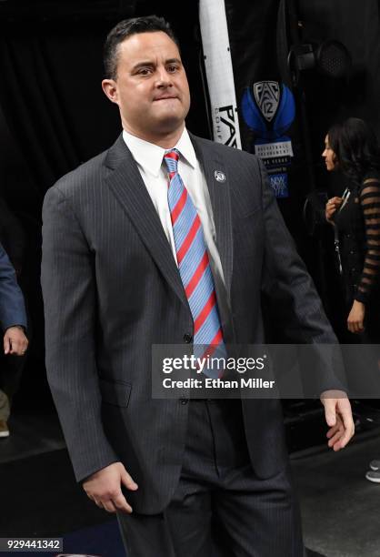 Head coach Sean Miller of the Arizona Wildcats walks onto the court before a quarterfinal game of the Pac-12 basketball tournament against the...