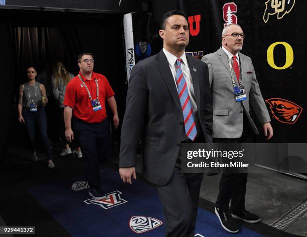 Head coach Sean Miller of the Arizona Wildcats walks onto the court before a quarterfinal game of the Pac-12 basketball tournament against the...