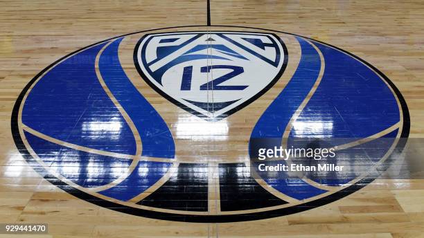 Pac-12 basketball logo is displayed on the court after a quarterfinal game of the Pac-12 basketball tournament between the Stanford Cardinal and the...