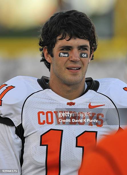 Quarterback Zac Robinson of the Oklahoma State Cowboys looks on during the game against the Iowa State Cyclones at Jack Trice Stadium on November 7,...