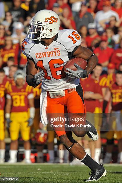 Cornerback Perrish Cox of the Oklahoma State Cowboys returns a kick off against the Iowa State Cyclones in the first half of play at Jack Trice...