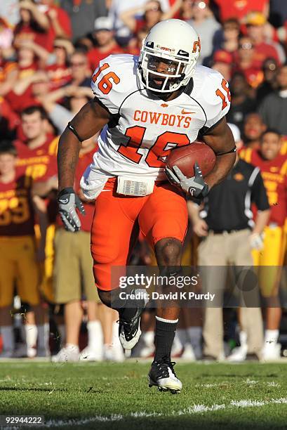 Cornerback Perrish Cox of the Oklahoma State Cowboys returns a kick off against the Iowa State Cyclones in the first half of play at Jack Trice...