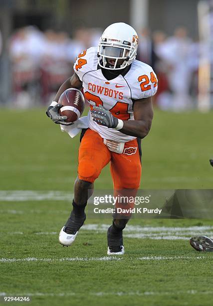 Running back Kendall Hunter of the Oklahoma State Cowboys rushes for yards up the middle against the Iowa State Cyclones in the second half of play...