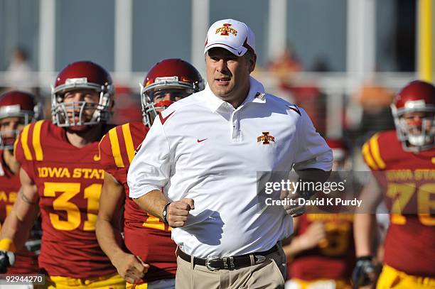 Head coach Paul Rhoads of the Iowa State Cyclones takes the field with his team before the game against the Oklahoma State Cowboys at Jack Trice...